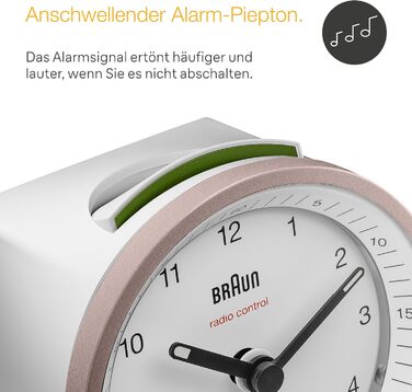 Classic analog radio alarm clock by Braun for the Central European Time zone (CET/GMT+1) with snooze function, lighting, quiet movement, crescendo alarm in white and rose, model BC07PW-DCF