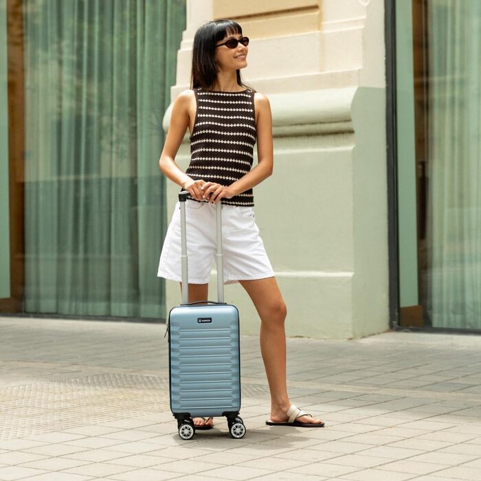 Чемодан ручної поклажі NUMADA Upfly 40x25x20 см (20 л) - ABS, знімні колеса, блакитний