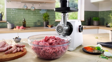 М'ясорубка Bosch Serie 6 MFWS607W 2100 Вт, реверс, біла