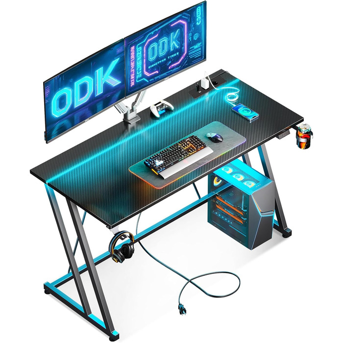 Ігровий стіл ODK з LED-підсвіткою та розеткою, комп'ютерний стіл 120 см, карбонове волокно, чорний, з підстаканником і гачком для навушників, подвійна Z-рама