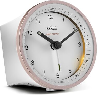 Classic analog radio alarm clock by Braun for the Central European Time zone (CET/GMT+1) with snooze function, lighting, quiet movement, crescendo alarm in white and rose, model BC07PW-DCF