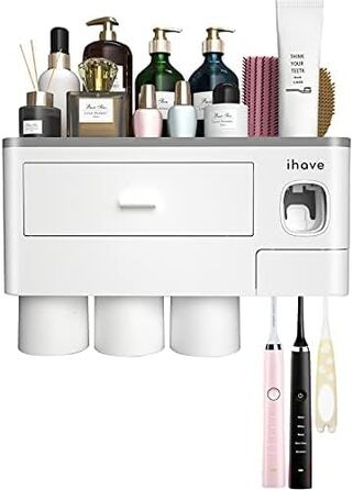 I have a bathroom toothbrush holder, 3-cup toothbrush holder with toothpaste dispenser, bathroom accessories with large storage space, cosmetic drawer, white