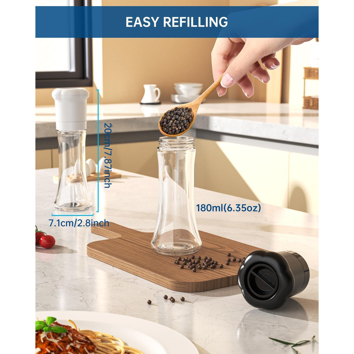 Набір ручних мельниць для солі та перцю CIRCLE JOY - ідеальний вибір для професійних кухарів. Мельниці з керамічними лезами, регульована ступінь подрібнення, скляні контейнери 180 мл, BPA-free, чорно-білий дизайн.