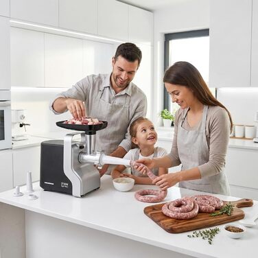 М'ясорубка електрична MG-2100BKSL 2100 Вт, нержавіюча сталь, чорно-срібна - 1.8 кг/хв, насадки для ковбас та томатів, реверс