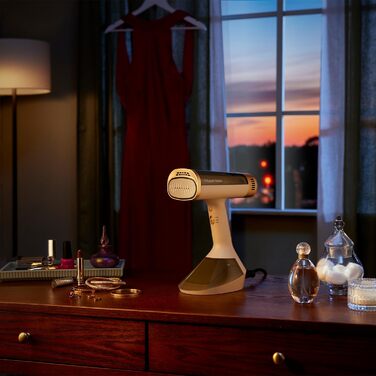 Відпарювач Russell Hobbs VacuSteam Pro: відпарювання та прасування з технологією всмоктування, керамічна підошва, 200 мл резервуар, 3 рівні потужності, для всіх тканин