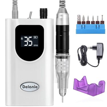 Електричний нагліфрезер Delanie 35000 об/хв для акрилових та звичайних нігтів - акумуляторний, з набором свердел, регулювання швидкості та напрямку (білий)