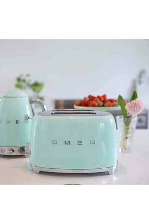 Тостер Smeg TSF02PBEU - 2 відділення для 4 скибочки хліба, 6 рівнів підсмажування, функція підігріву, розморожування та Bagel, знімний піддон, 1500W, пастельно-блакитний (пастельно-зелений)