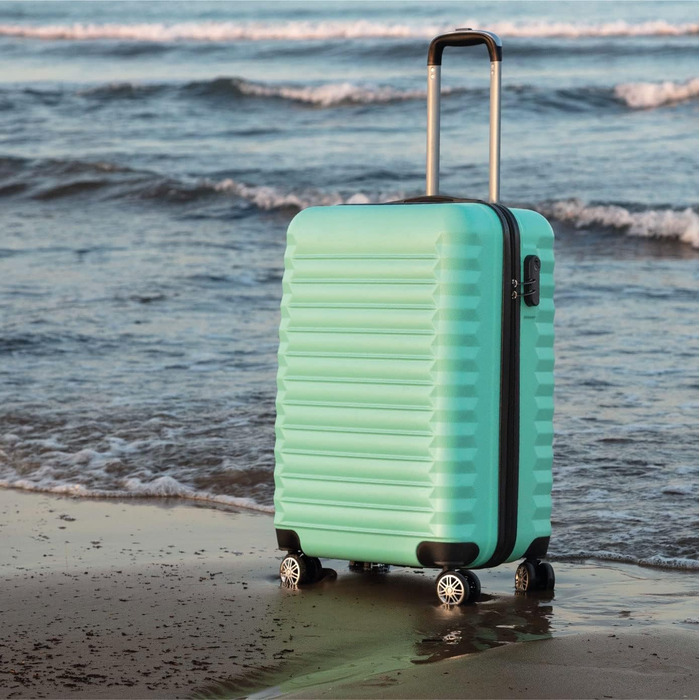 Набір валіз NUMADA 3 шт. (кабіна, середня) з культовою сумкою, м'ятно-зелений, ABS, міцний, з коліщатами та замком