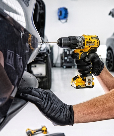 Ударний дриль-шурупокрут DeWalt 12V 57/25Nm 2x2,0Ah DCD706D2