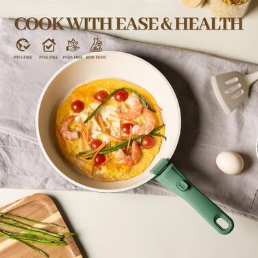 Набір посуду керамічний 23 предмети з антипригарним покриттям та знімними ручками, чорний. Підходить для всіх типів плит, включаючи індукційні. Сковороди 20/26 см, каструля 18 см, сотейник 24 см. Можна використовувати в духовці.